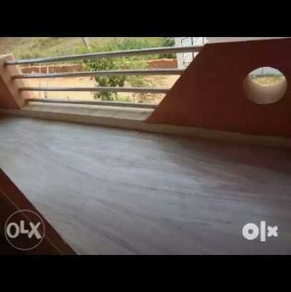 1 BHK drawing dinning marble furnished with completely tilled kitchen and a large sized balcony